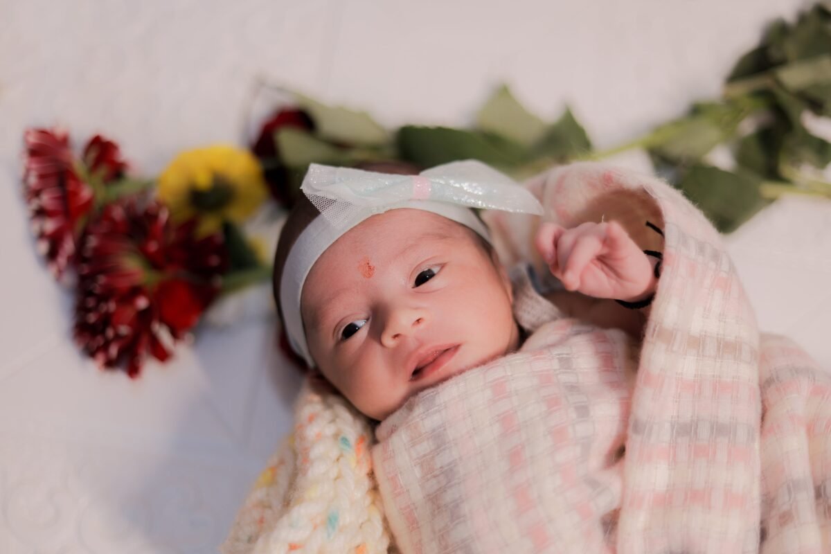 Beautiful newborn baby close-up portrait with soft natural lighting