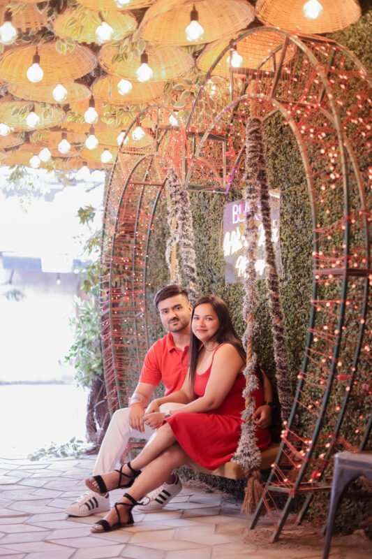 Romantic outdoor pre wedding couple shoot with elegant red outfit
