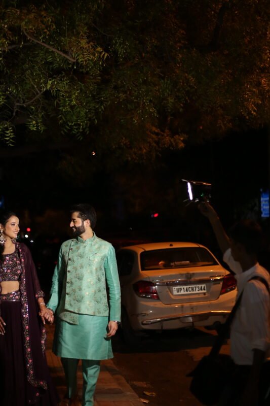 Cinematic couple mehndi photography outdoor night shoot with luxury wedding lighting – Meerut