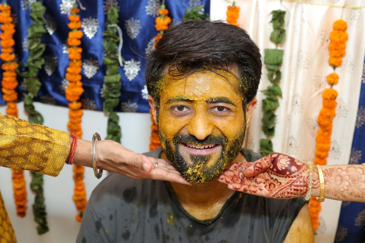 Groom haldi portrait shoot with yellow kurta and traditional wedding celebration – Greater Noida