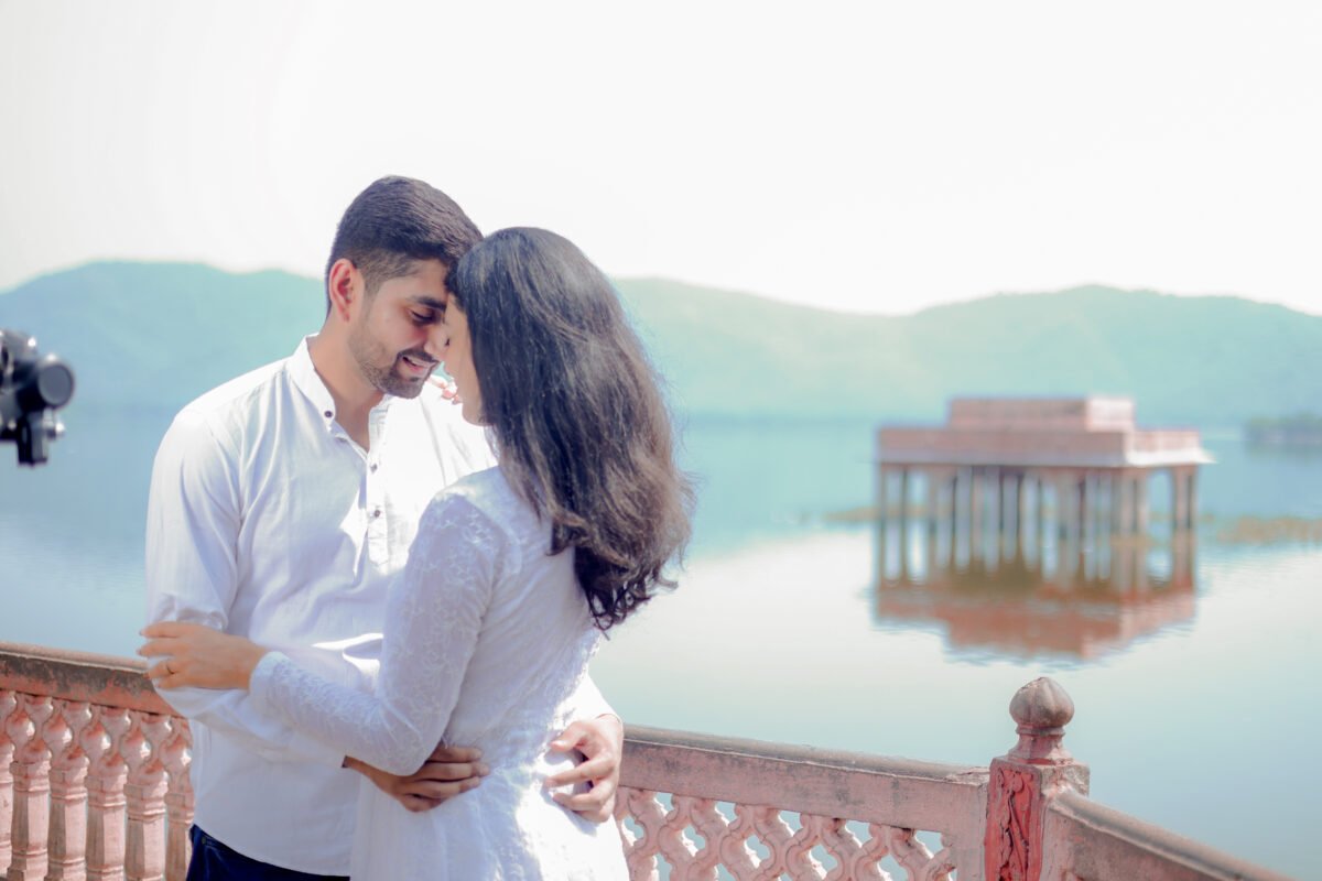 Romantic lakeside pre wedding couple photography with candid poses