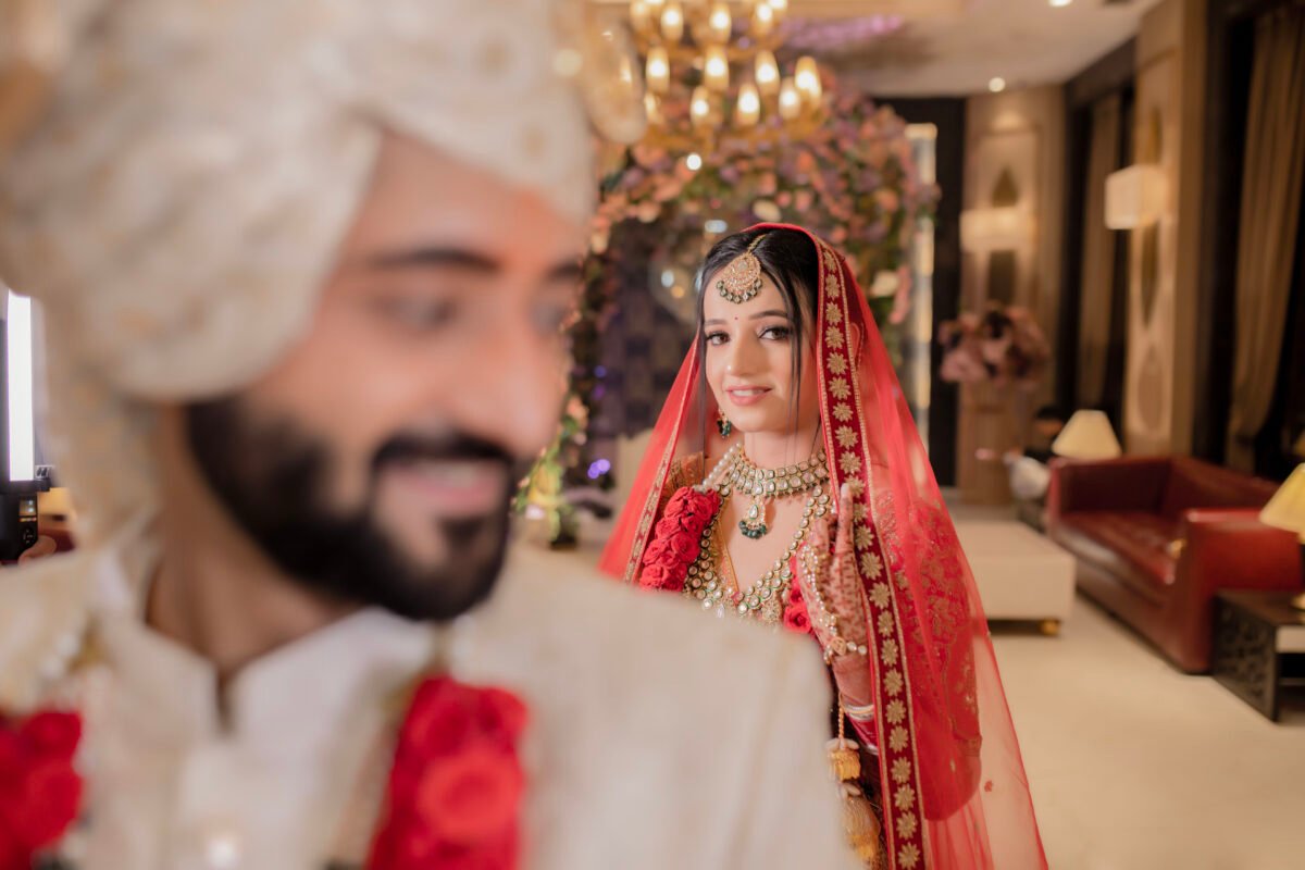 Close up candid portrait of Indian bride and groom during wedding rituals