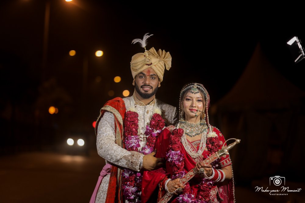 Wedding couple entry moment indoor venue Delhi NCR professional photography
