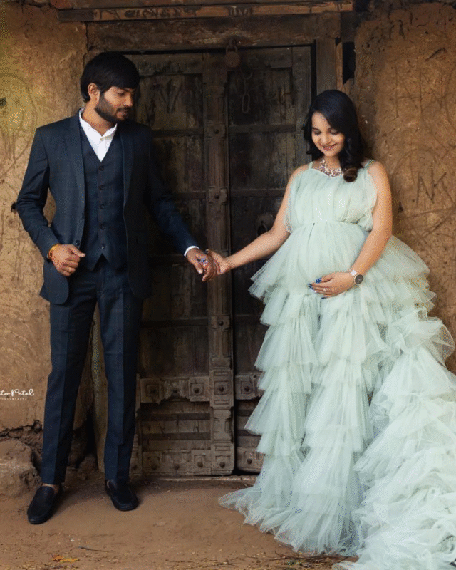 Stylish maternity photoshoot couple in green gown – pregnancy shoot Delhi NCR MYM Photography