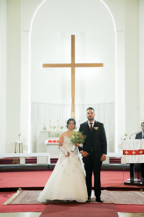Church wedding ceremony bride groom in front of cross Delhi NCR