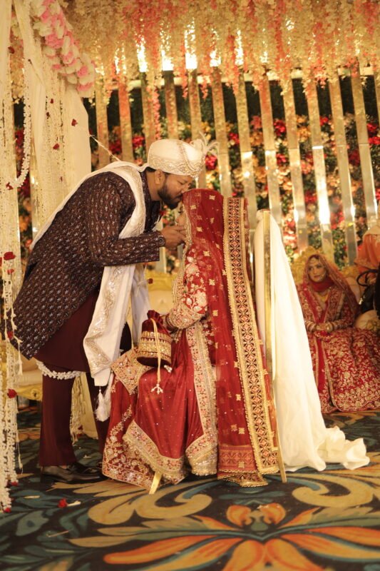 Wedding couple entry moment indoor venue Delhi NCR professional photography