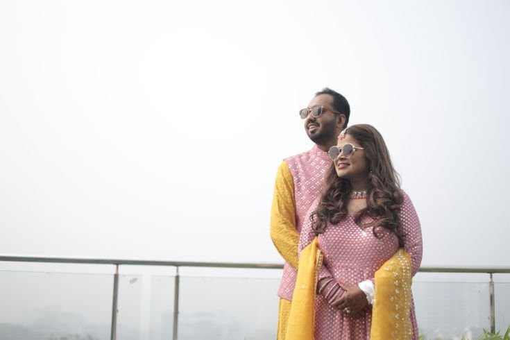 Romantic haldi couple photography with candid smiles and natural poses