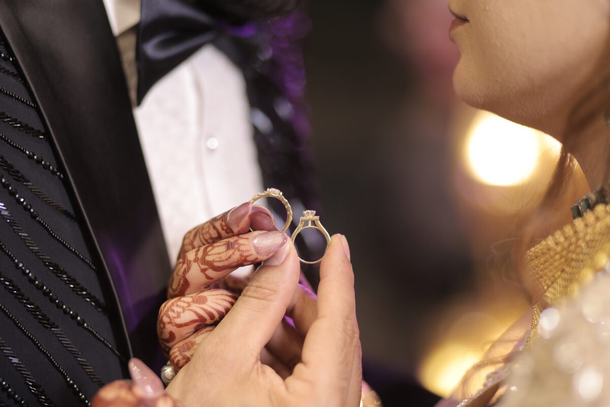 Bride showing engagement ring candid photography