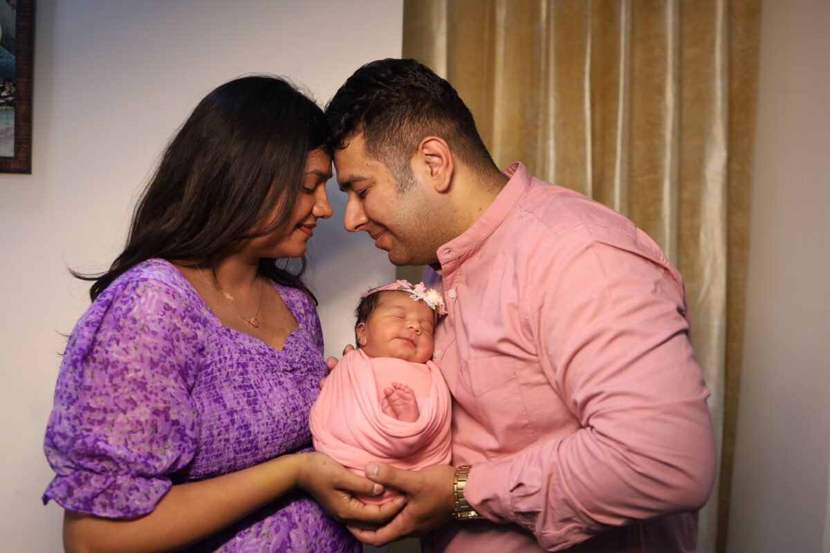 Family newborn baby photography with parents
