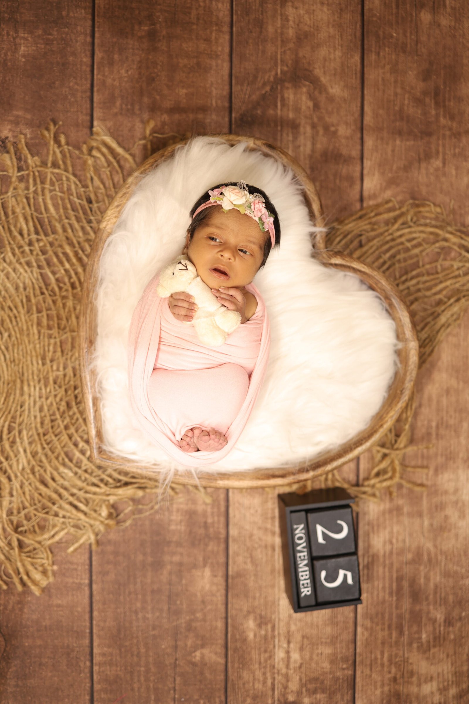 Newborn Baby in Heart Basket