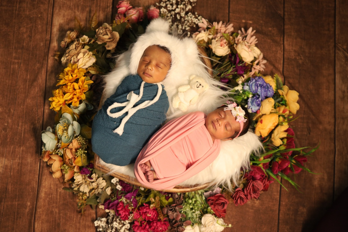 Newborn baby photography with floral setup