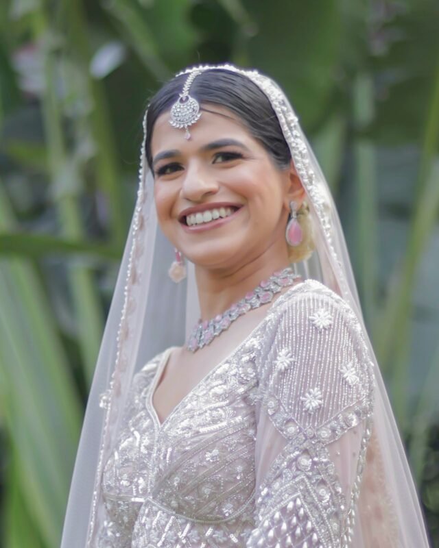 Close-up of smiling Indian bride.