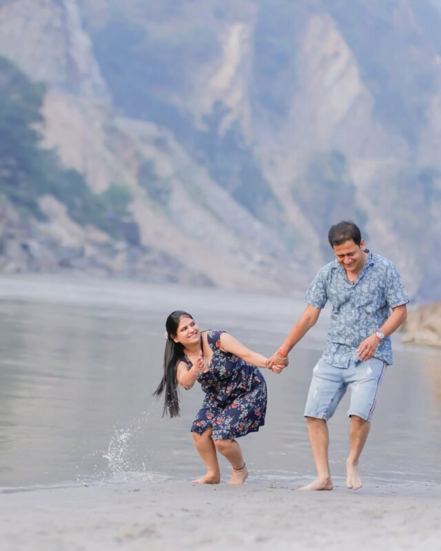 Couple enjoying a riverside pre wedding shoot.