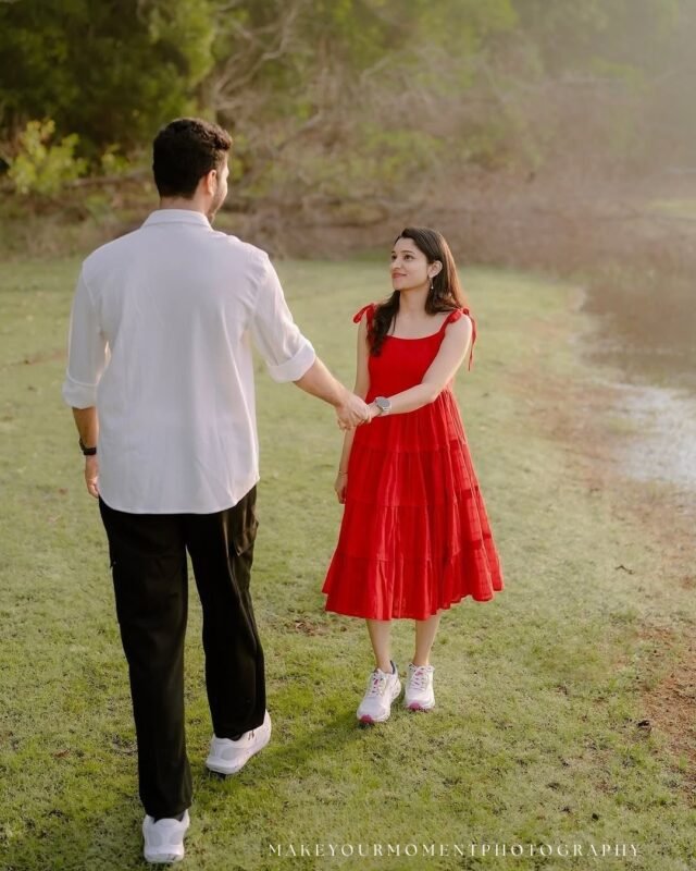 Romantic couple walking hand in hand during a pre wedding photoshoot in Delhi NCR