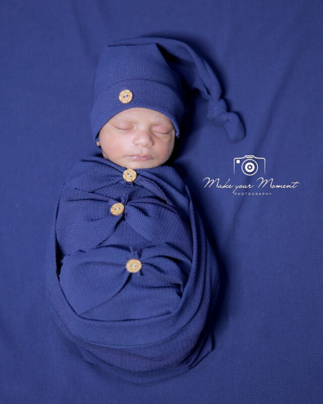Wrapped Newborn Baby Portrait