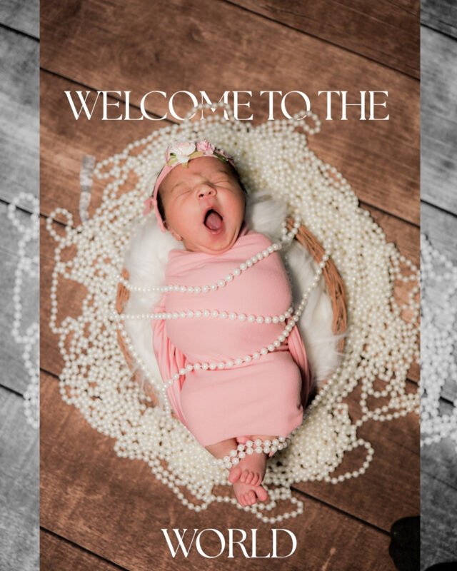 Newborn Baby Wrapped in Pink