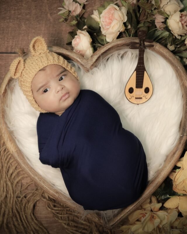 Baby portrait with toy
